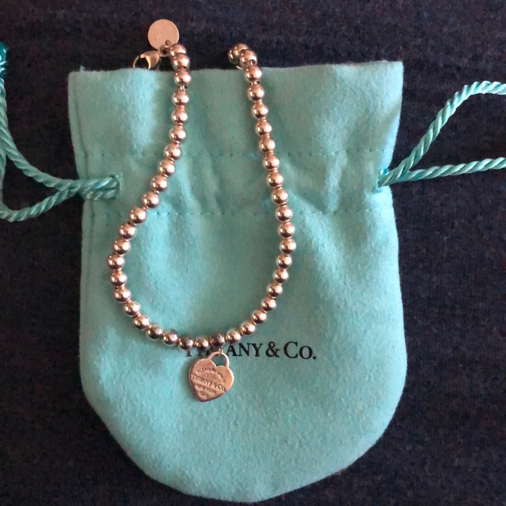 “Please return to Tiffany & Co.” bracelet.